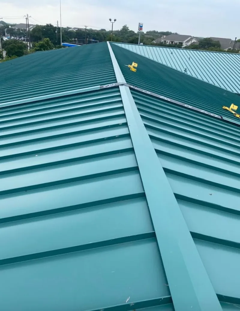 Green commercial metal roof ridge and valley for Metal Roof Repair in Streator