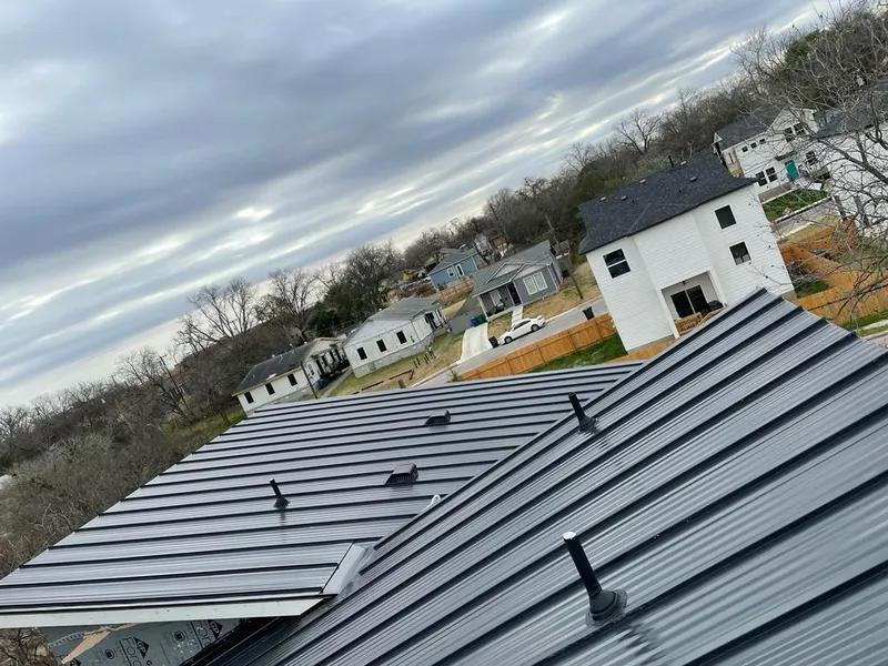 Standing seam metal roof panels with vents for Skylight Repair in Streator